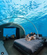 Muraka, Maldív-szigetek

Ha arra vágysz, hogy szó szerint az óceán közepén aludj, akkor ezt a szállodát öt méterrel a felszín alatt neked találták ki. A Muraka néven ismert hotel egy kétszintes, három szobás tenger alatti rezidencia, rendkívül modern dizájnnal. A víz alatti hálószobák teteje és oldalai teljesen átlátszók, így a vendégnek rálátása nyílik a teljes víz alatti világra ott tartózkodásuk során. Természetesen egy étterem is található a különleges hotelben, aki pedig a Murakát választja, saját inast és szakácsot is kap majd a legexkluzívabb élményért – mindez 40.000 dollárba kerül éjszakánként.