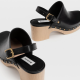 Stradivarius Wood-effect heeled clogs with studs 12 995 Ft