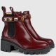 Gucci Women's ankle boot with belt 

Ez a bordó gumicsizmás-magassarkús bokacsizma még nem is olyan rossz, legalábbis az összeállításban szereplő többi darabhoz képest. Azért 370 ezer forintot nem biztos, hogy megér. 