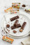 Mogyorókrémes csokoládészelet

Egyszerre roppanós és krémes csokoládészelet, ami&nbsp;igazi újdonság a mentes csokik körében. A 72% kakaótartalmú cukormentes étcsokoládéban egy selymes és lágy mogyorókrémes töltelék kapott helyet, így a roppanós étcsoki és a lágy töltelék tökéletes összhangja már az első falattal elvarázsol minket.
