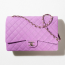 Chanel Maxi Classic Handbag
