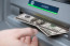 A hírek szerint az ATM-ek előre jelzik majd a felszámítandó költséget, így egy már megkezdett tranzakció esetében is meg lehet szakítani a folyamatot, ha a kártyatulajdonos mégsem vállalná a plusz díj kifizetését.
