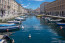 A fotókon Triesztet, Észak-Olaszország gyönyörű kikötővárosát csodálhattad meg. Te is Triesztre tippeltél? Ha igen, minden elismerésünk: te tényleg felülmúlhatatlanul zseniális földrajztudor vagy!
